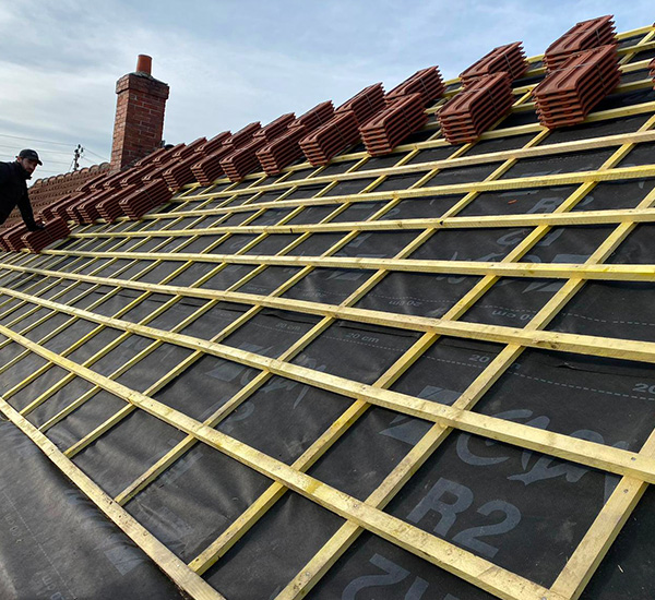 Pose de tuile ardoise et zinc à Avon (77210) en Seine-et-Marne (77)